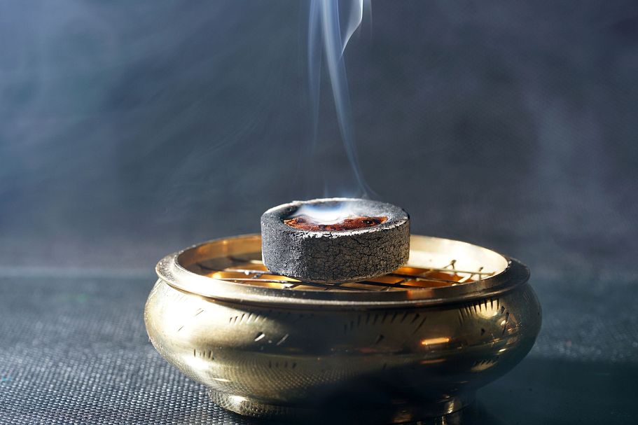 closeup-shot-of-lighting-charcoal-on-a-bowl-2026-01-07-07-35-47-utc